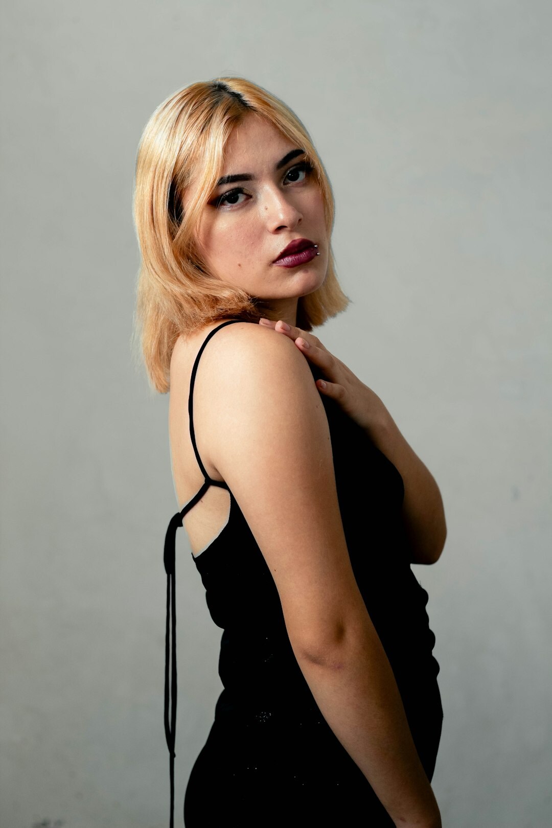 Studio portrait of a professional woman with short blonde hair