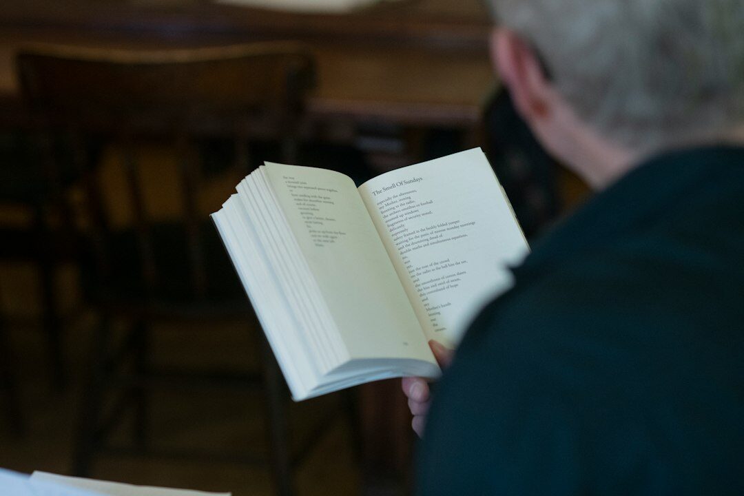 Colleague reviewing notes during a discussion in a meeting room